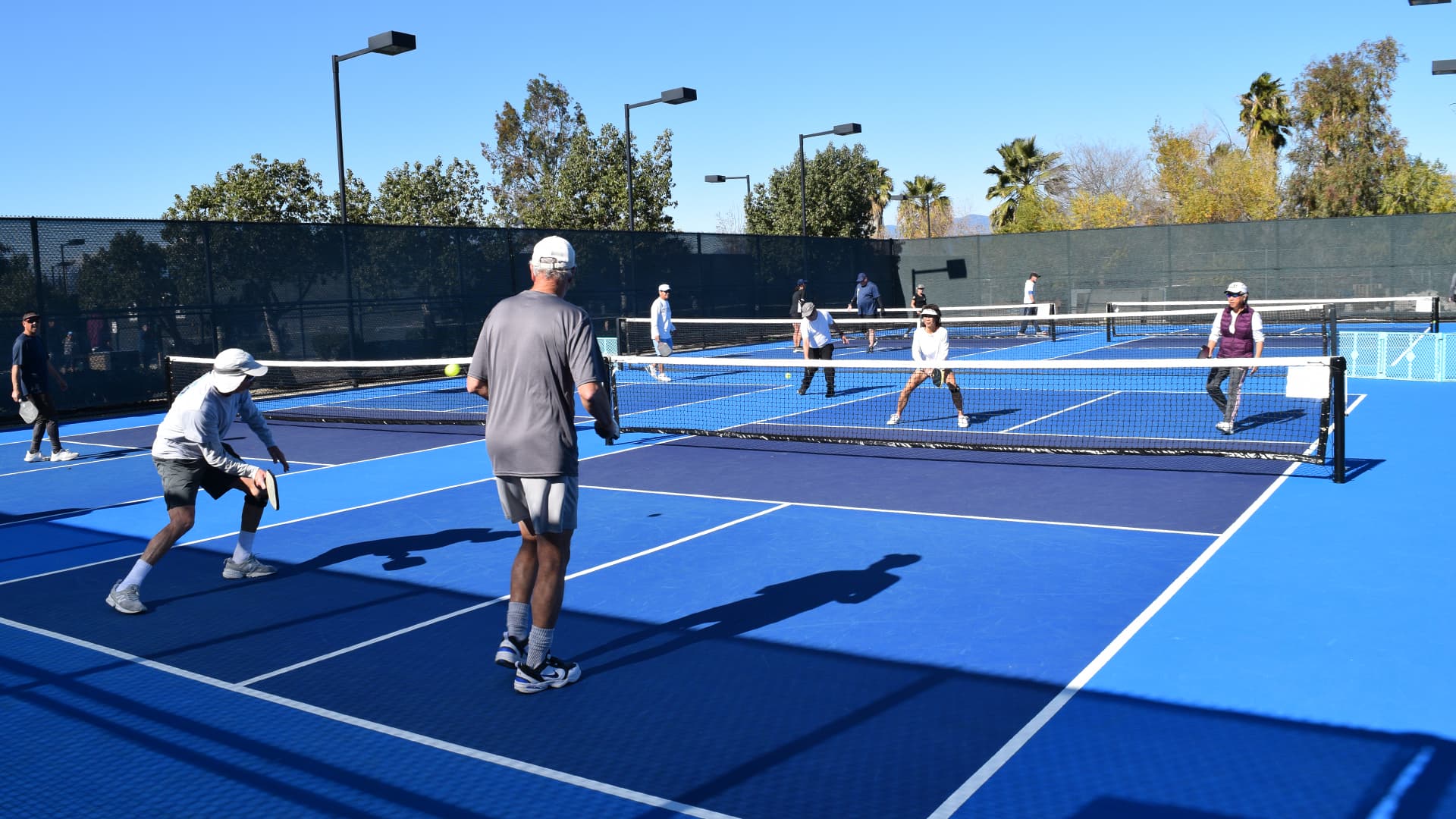 Hong Kong Pickleball League players in action during a tournament, showcasing the competitive spirit of our community