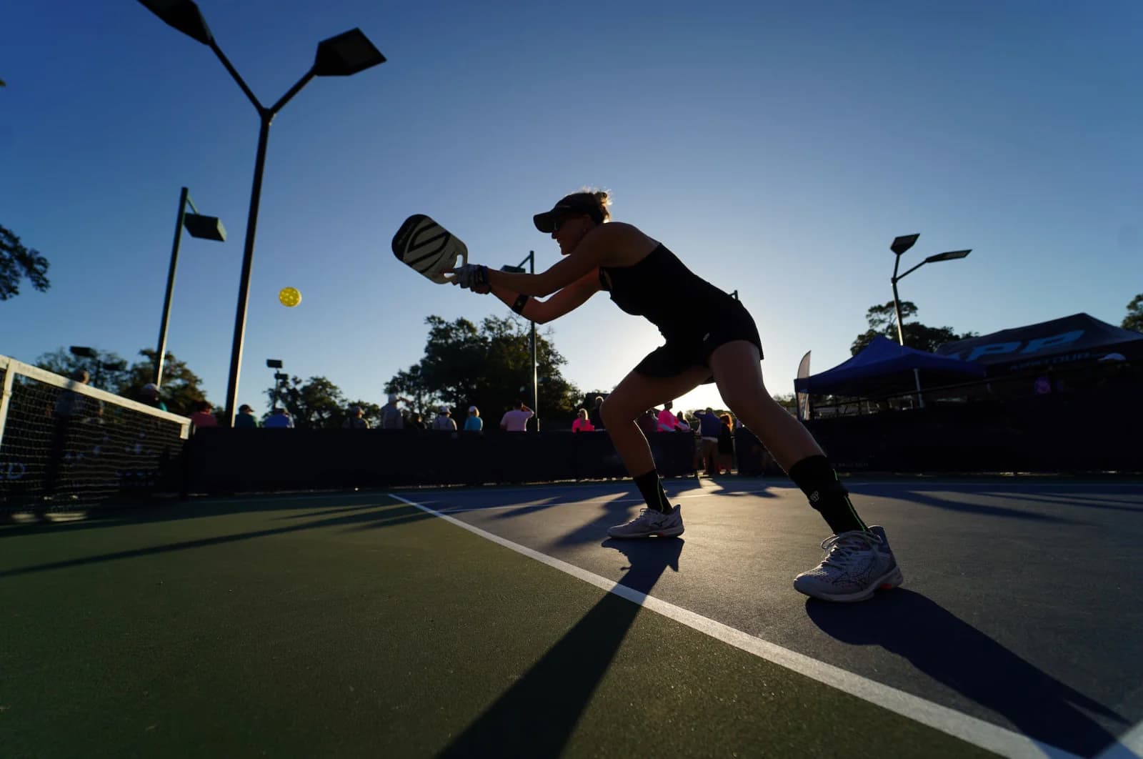 Division B pickleball players competing, representing intermediate skill level players with DUPR ratings below 3.599